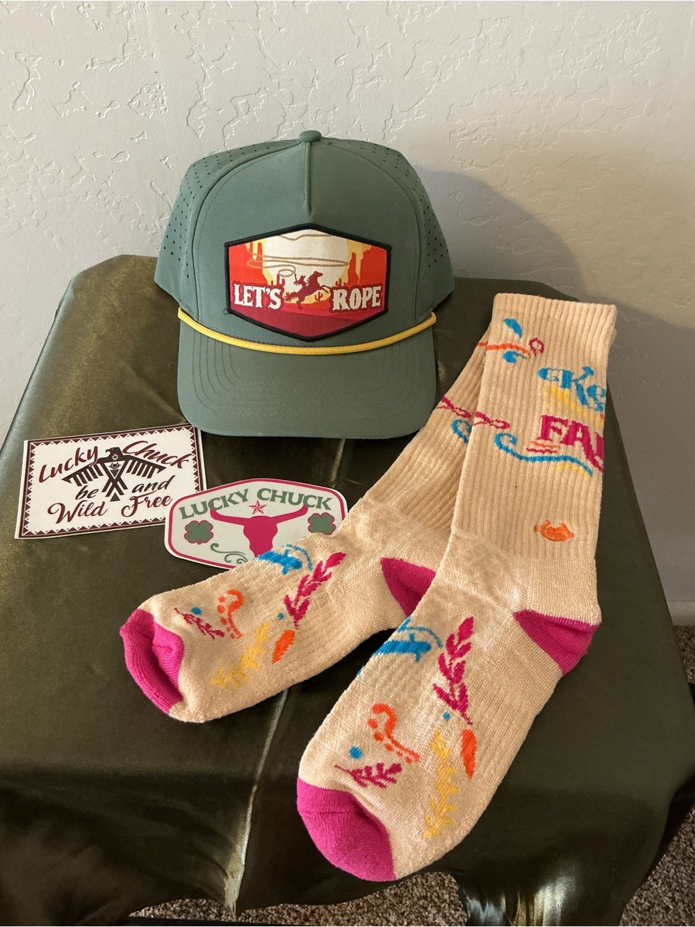 Bundle of “Lucky Chuck” Cap, Socks, & Stickers